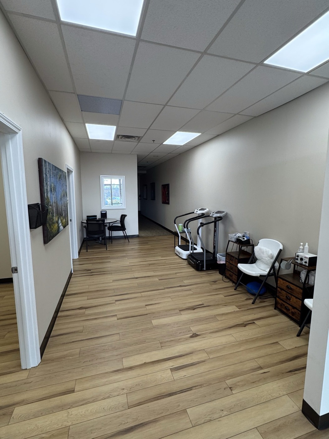 Clinic hallway with rehabilitation equipment inside Missouri Injury Clinic